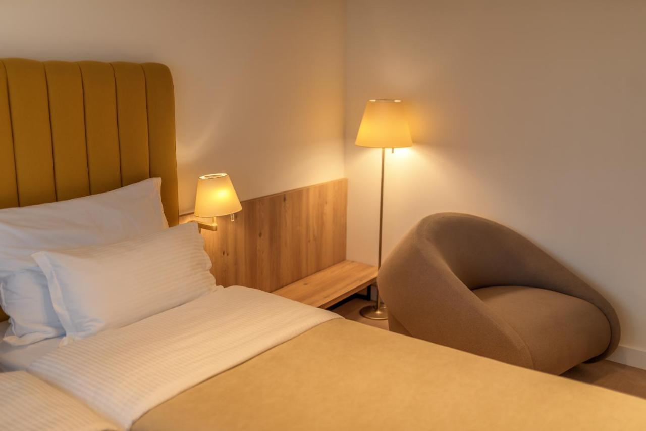 Hotel Agape Bar Bagian luar foto