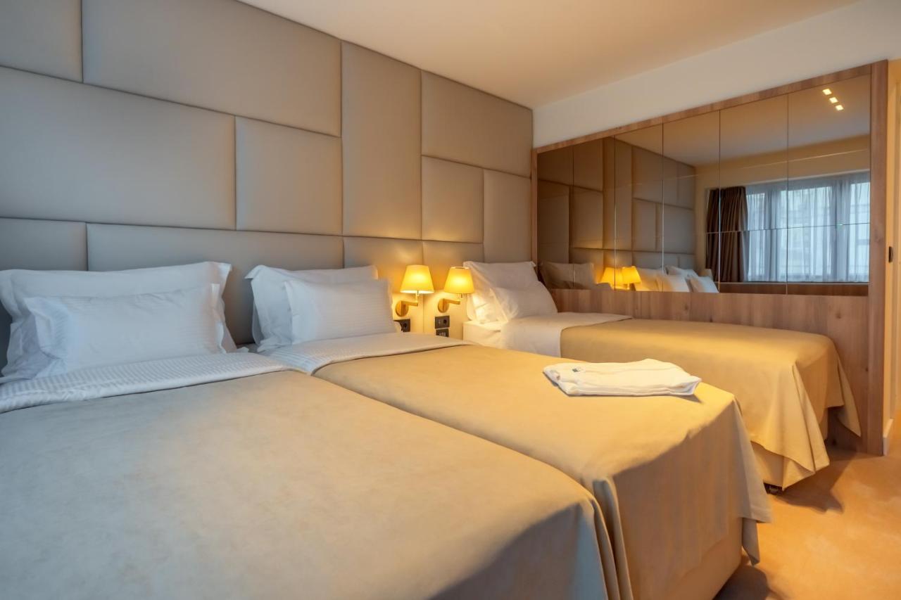 Hotel Agape Bar Bagian luar foto