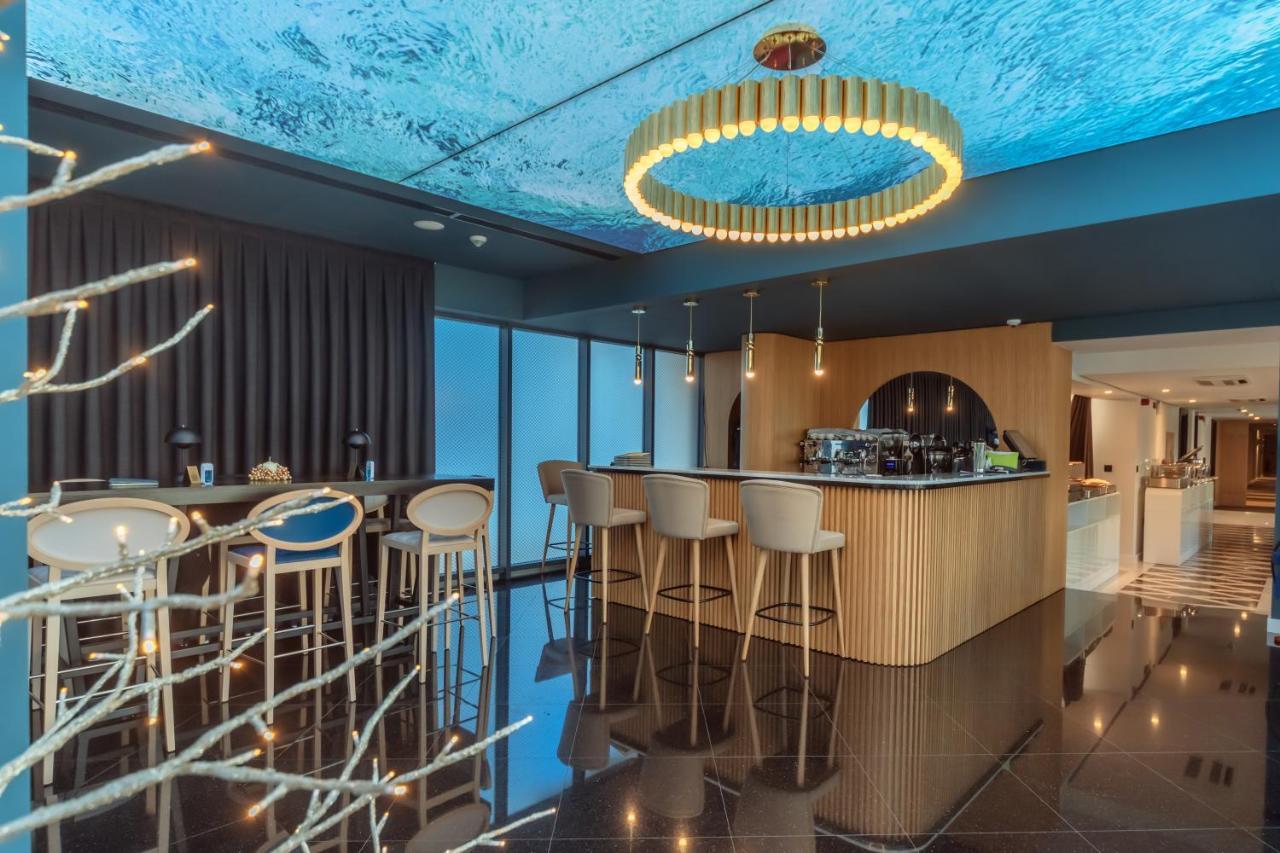Hotel Agape Bar Bagian luar foto