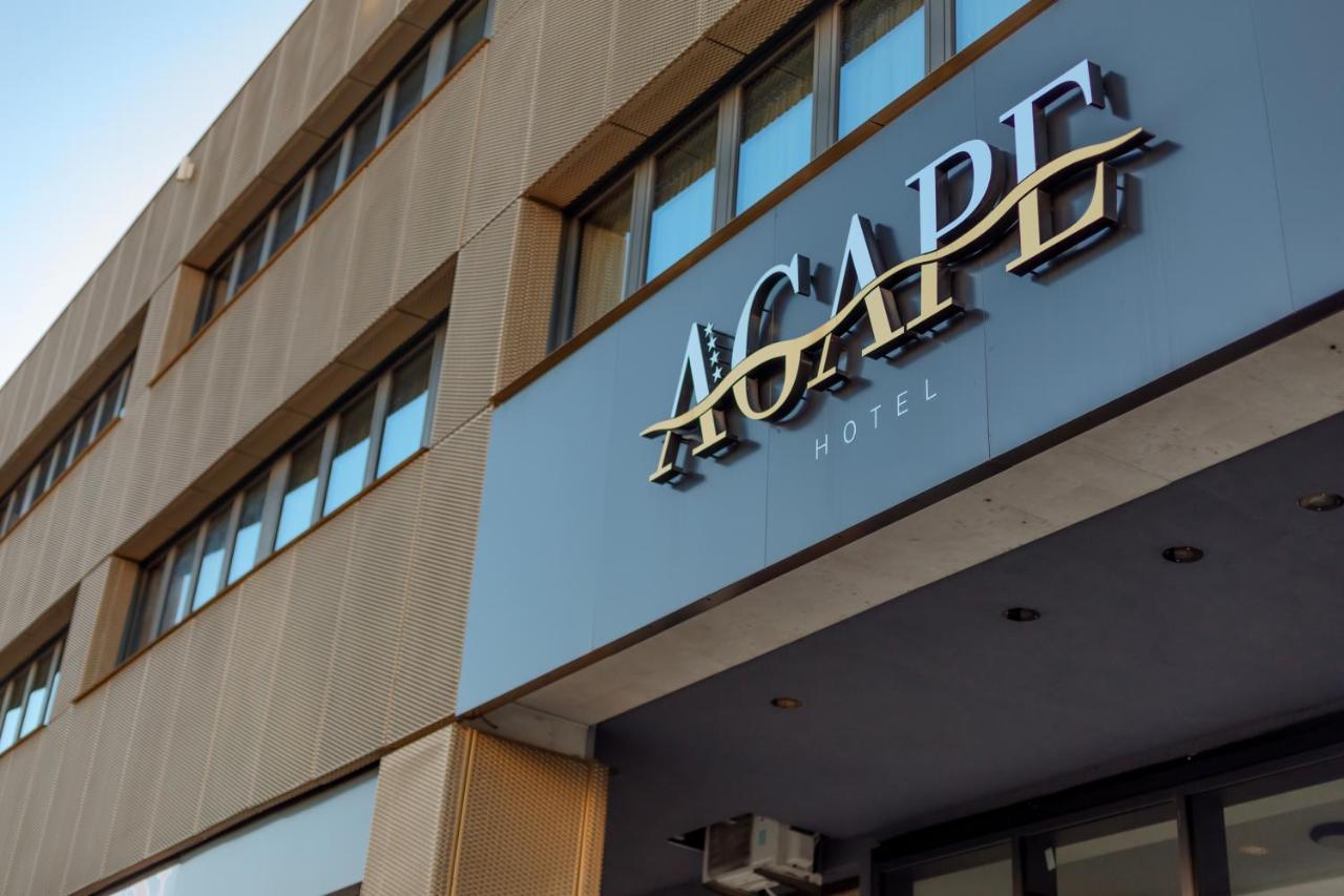 Hotel Agape Bar Bagian luar foto